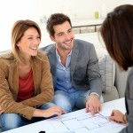 Couple meeting architect for house construction