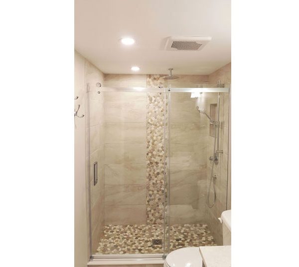 Pebble stone shower base and accent border