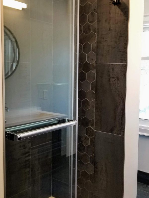 Sliding glass door shower system