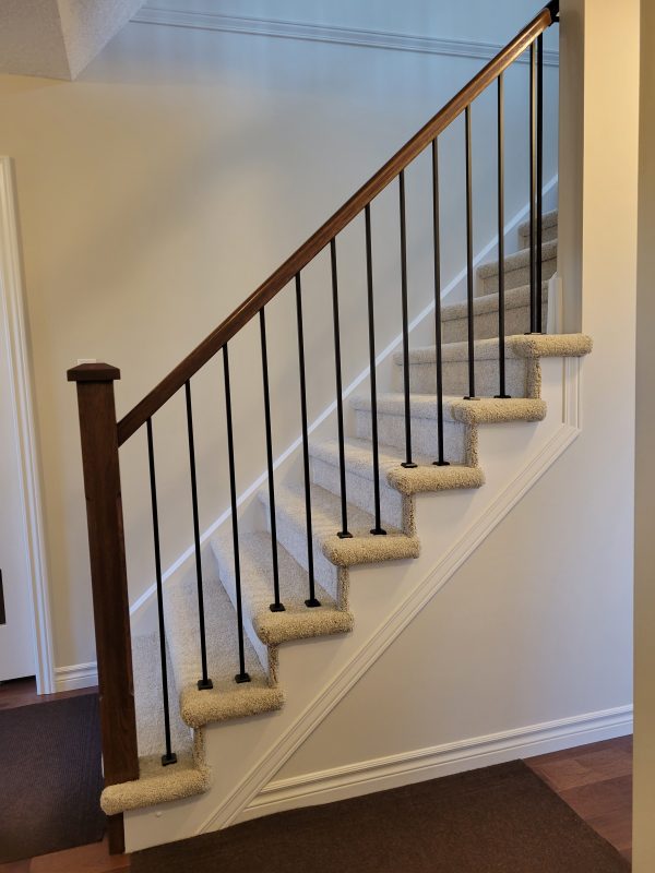 New handrail system installed with iron spindles