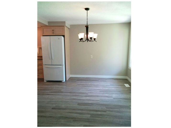 Affordable and stylish vinyl plank flooring in dining room