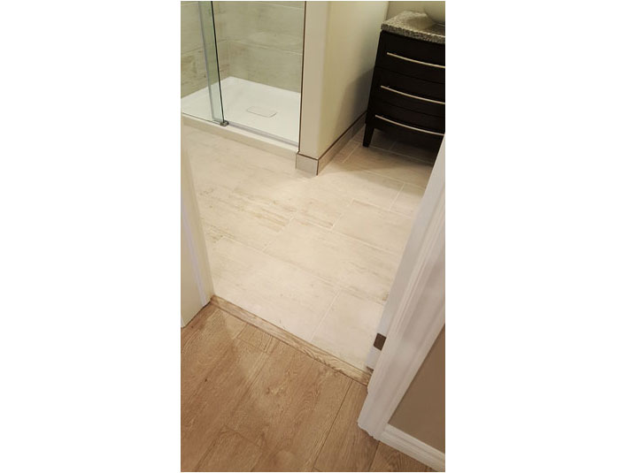 Transition strip from laminate to porcelain tile floor