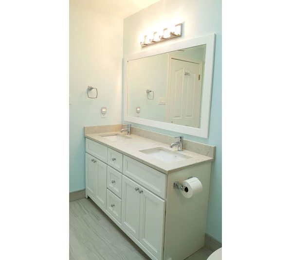 White double sink vanity with matching mirror