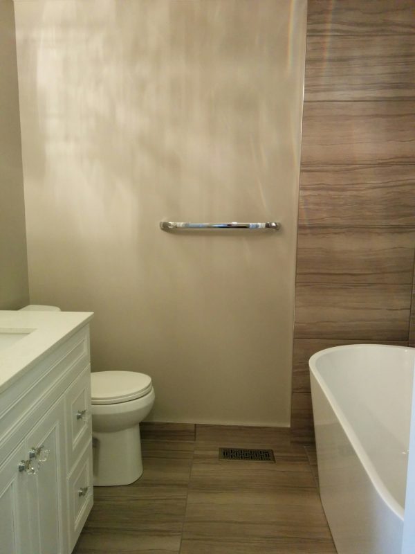 Tiled floors, baseboards and walls