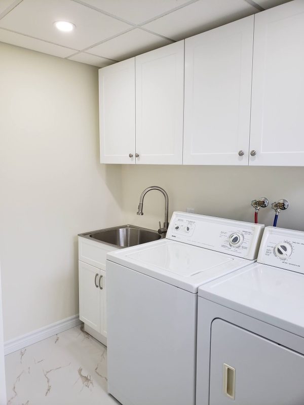 A laundry unit with new faucet was installed