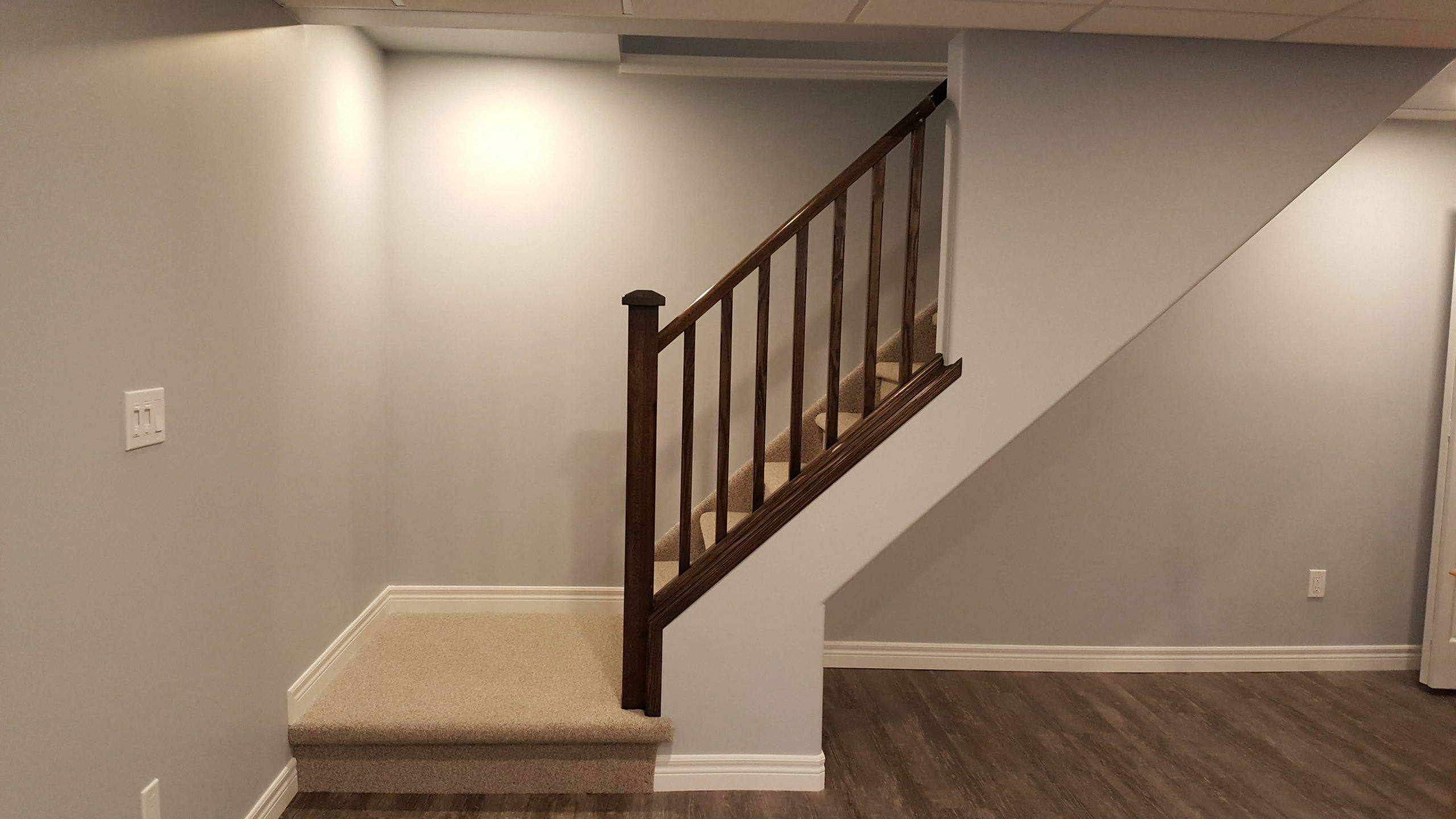 Oak railing in basement