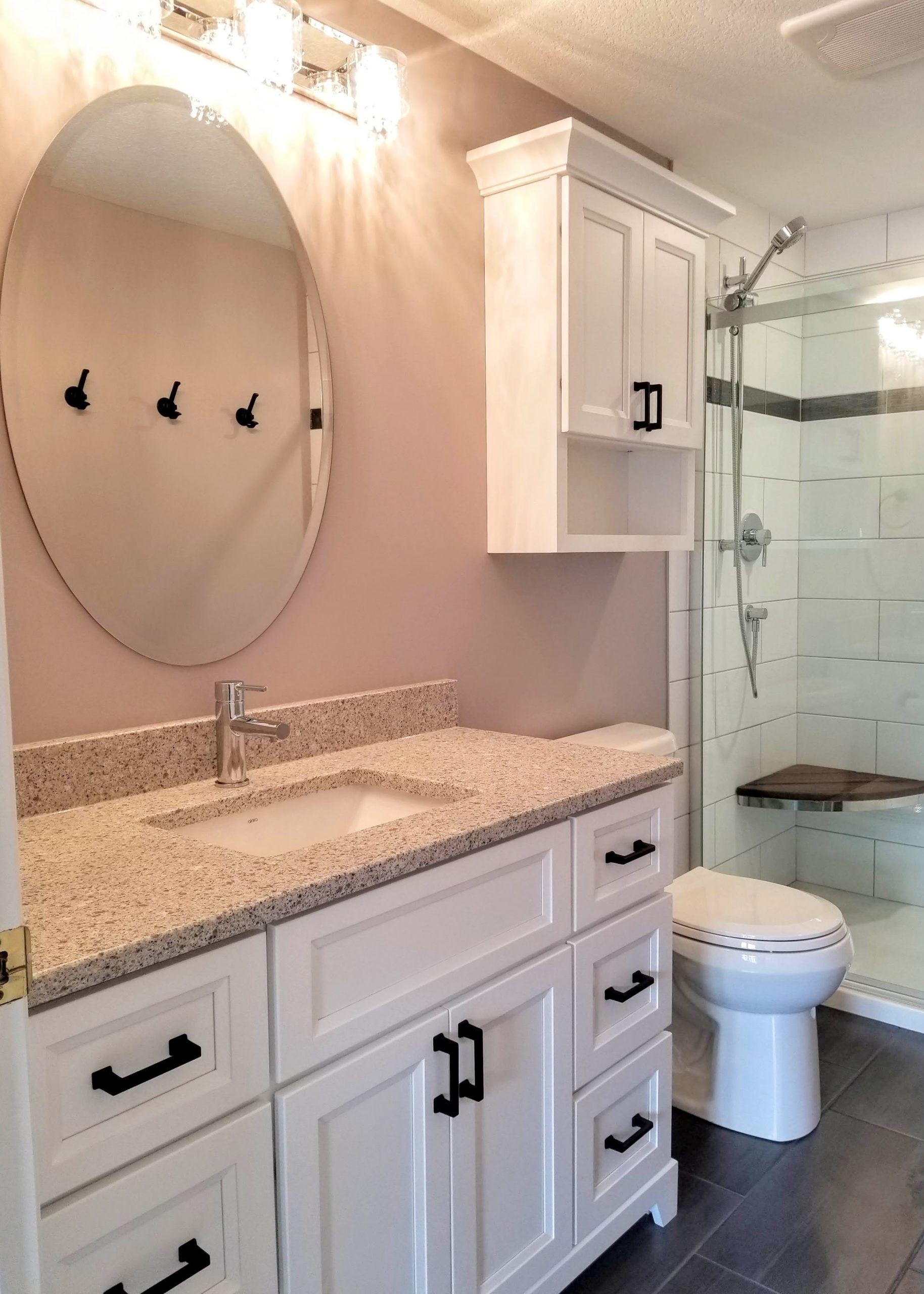 White vanity with quartz countertop