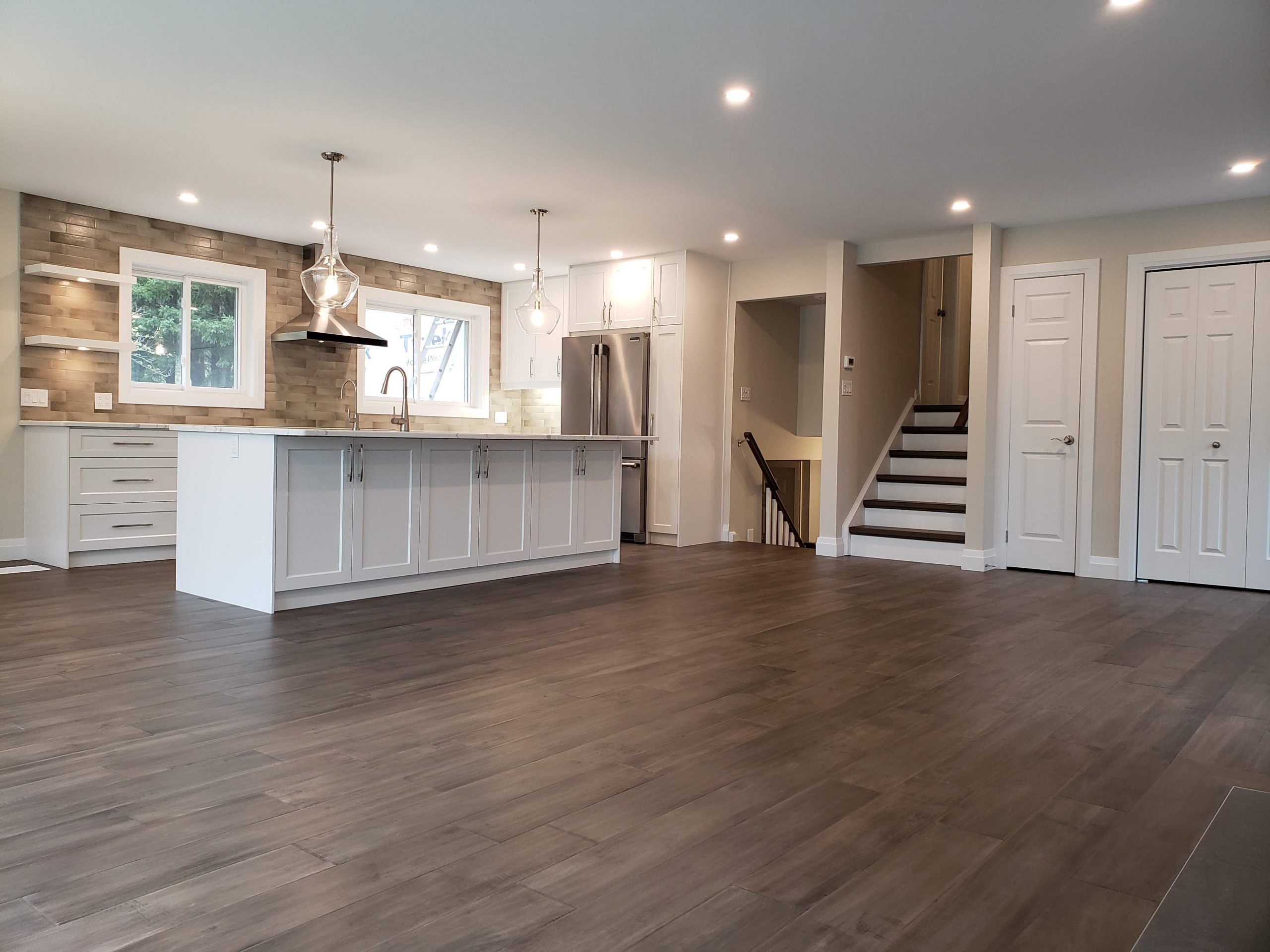 Dividing walls removed for open concept layout