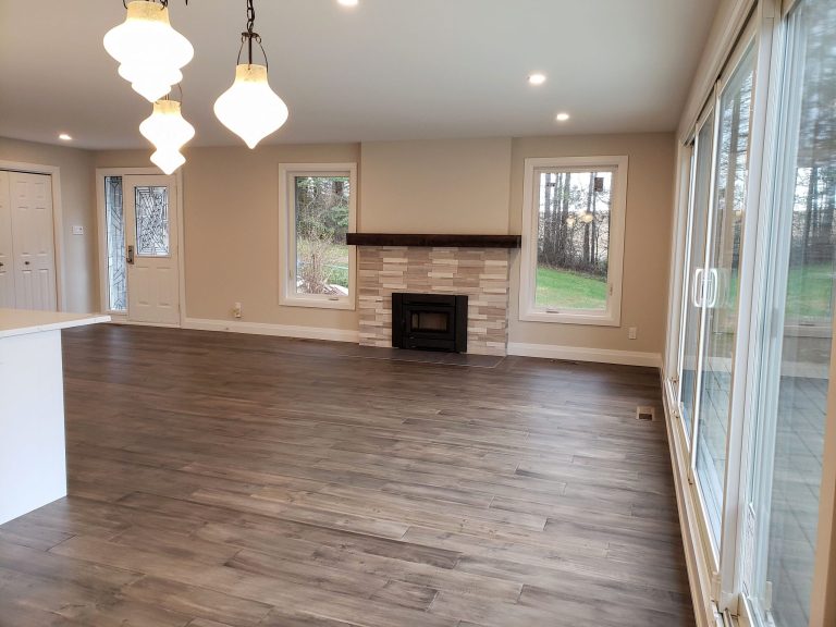 Open concept living room, with updated windows