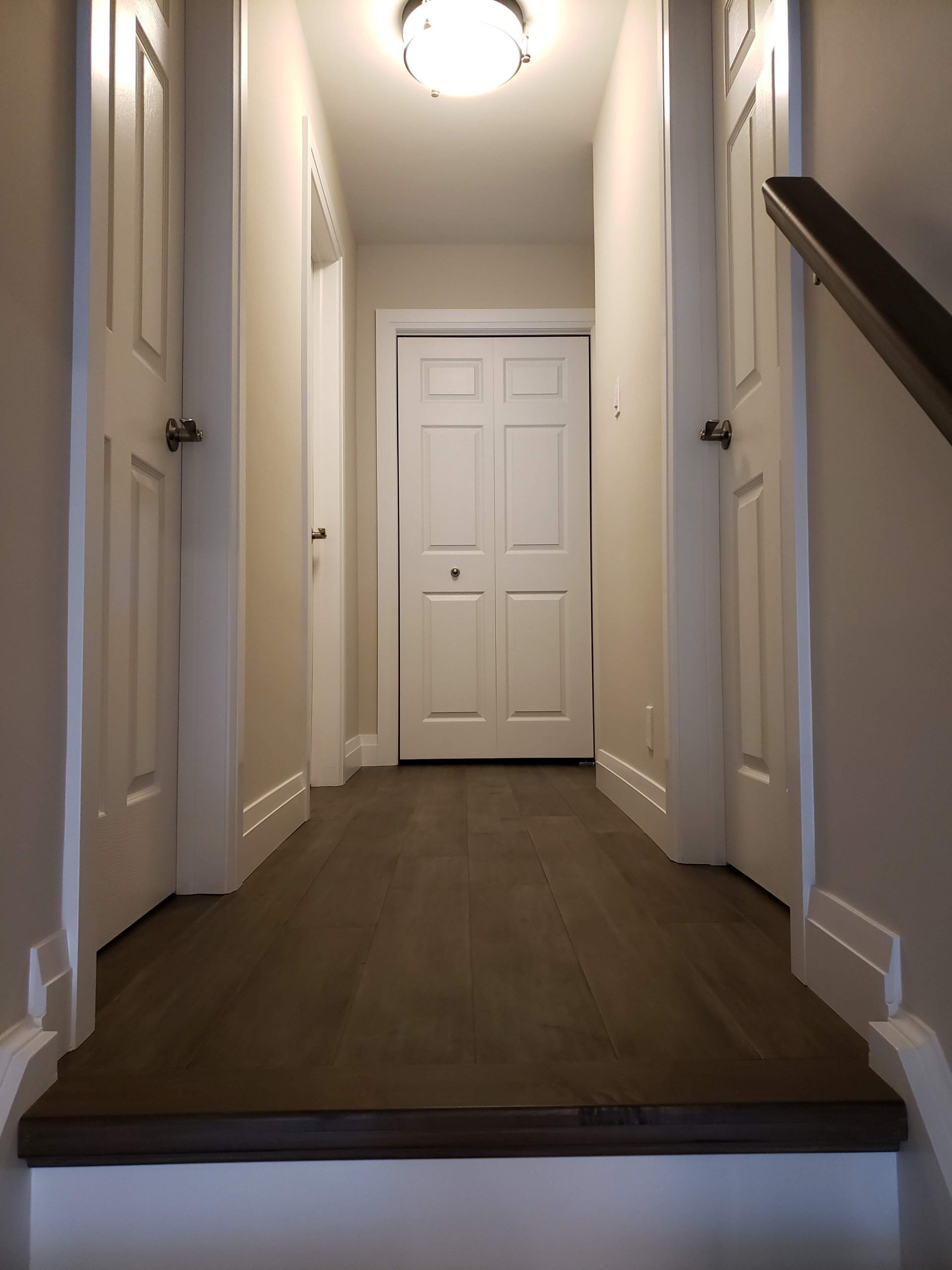 Engineered hardwood flooring installed in hallway
