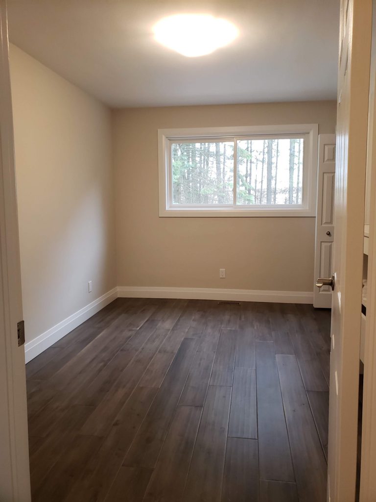 Engineered hardwood flooring and a new window installed