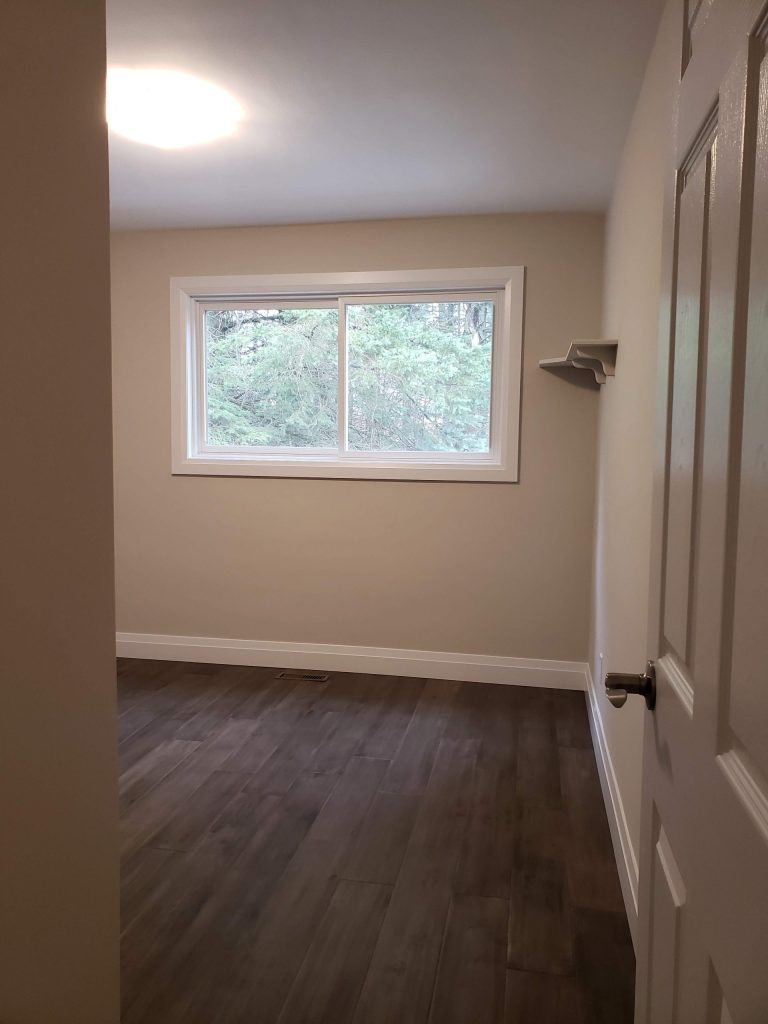 Engineered hardwood flooring and new window installed