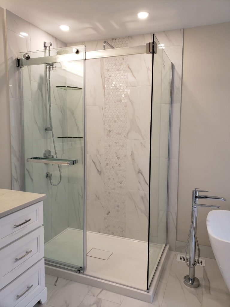 Porcelain tile shower surround with acrylic shower base