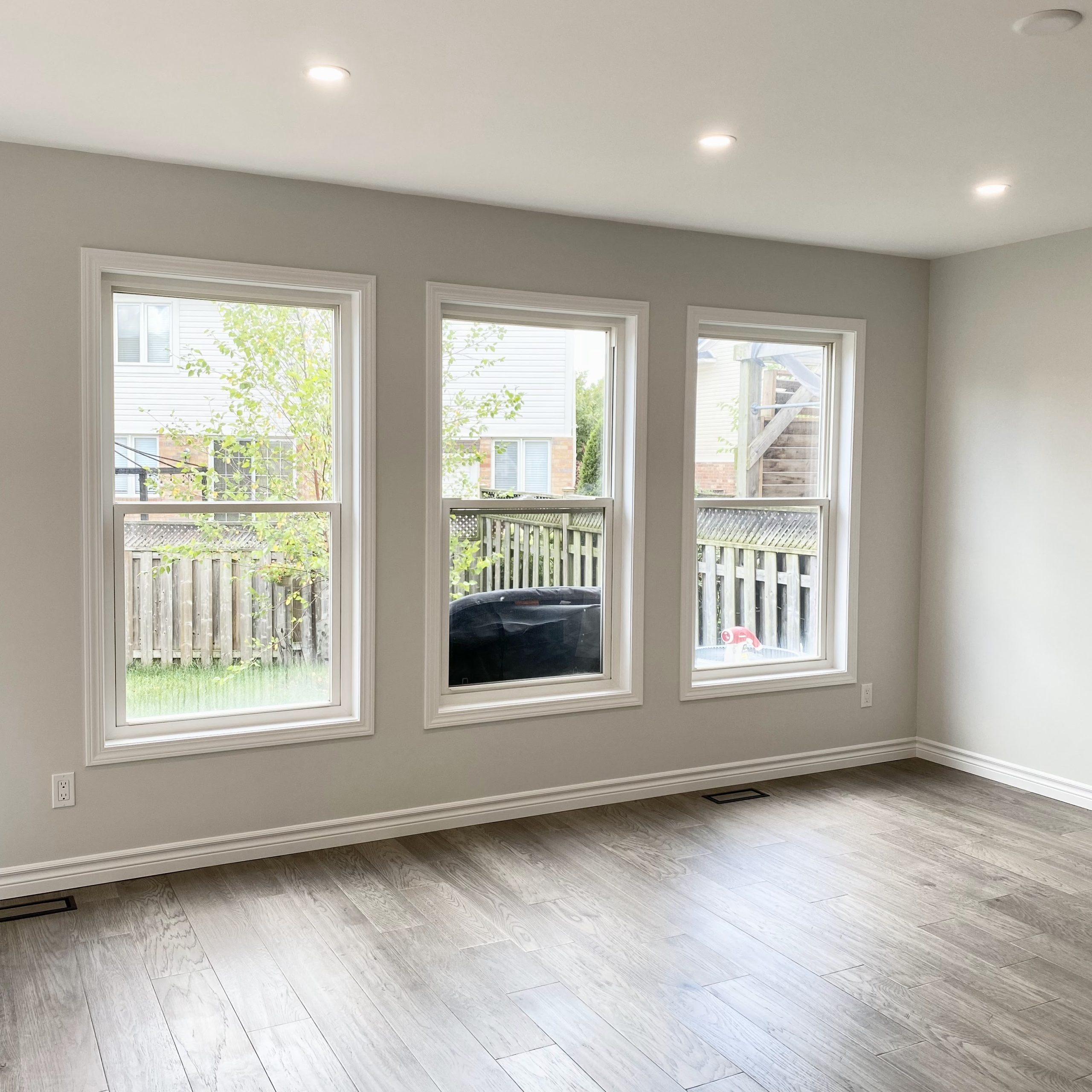 Engineered hardwood flooring installed throughout main floor