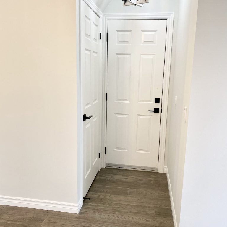 Matte black door hardware installed