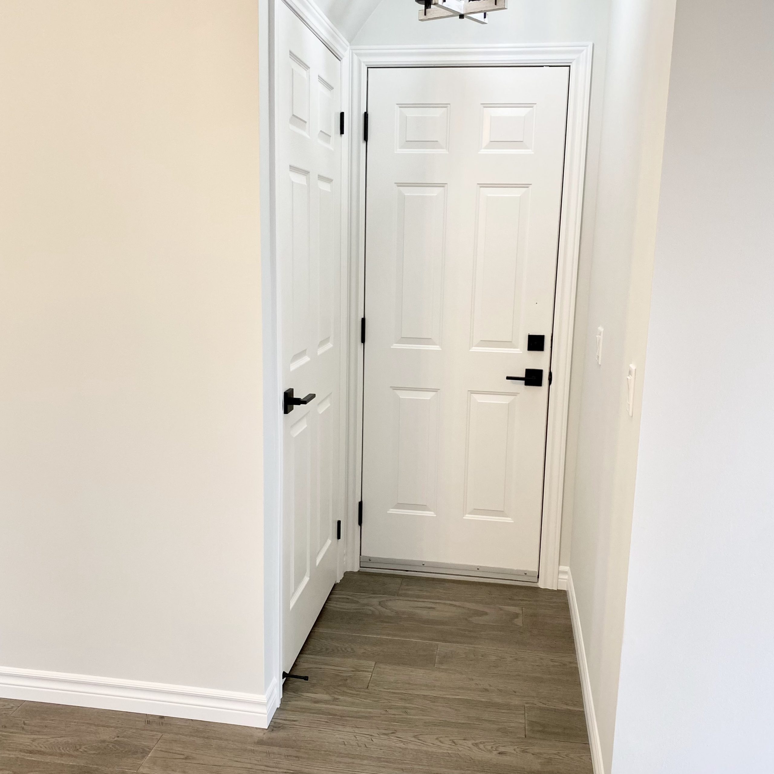 Matte black door hardware installed