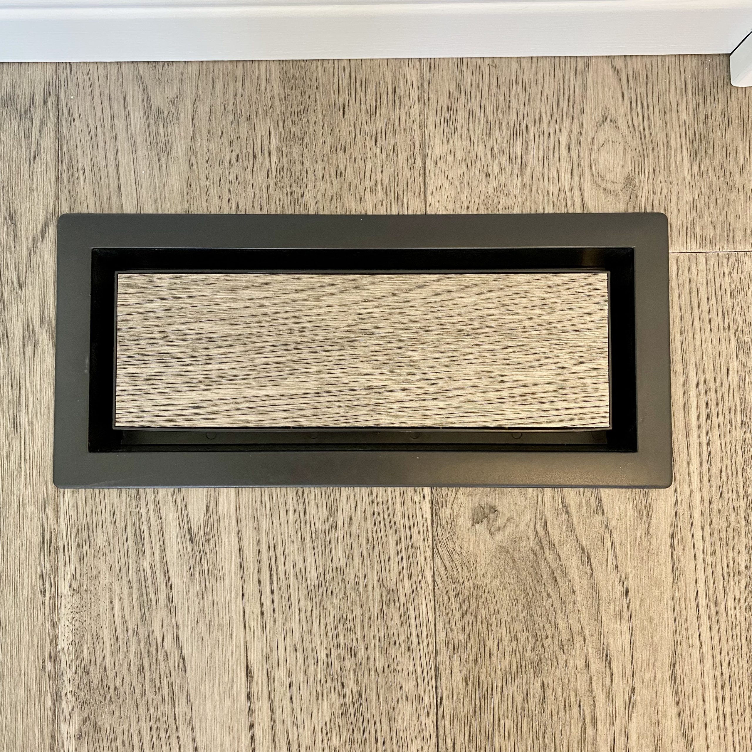 Heat register with floor insert